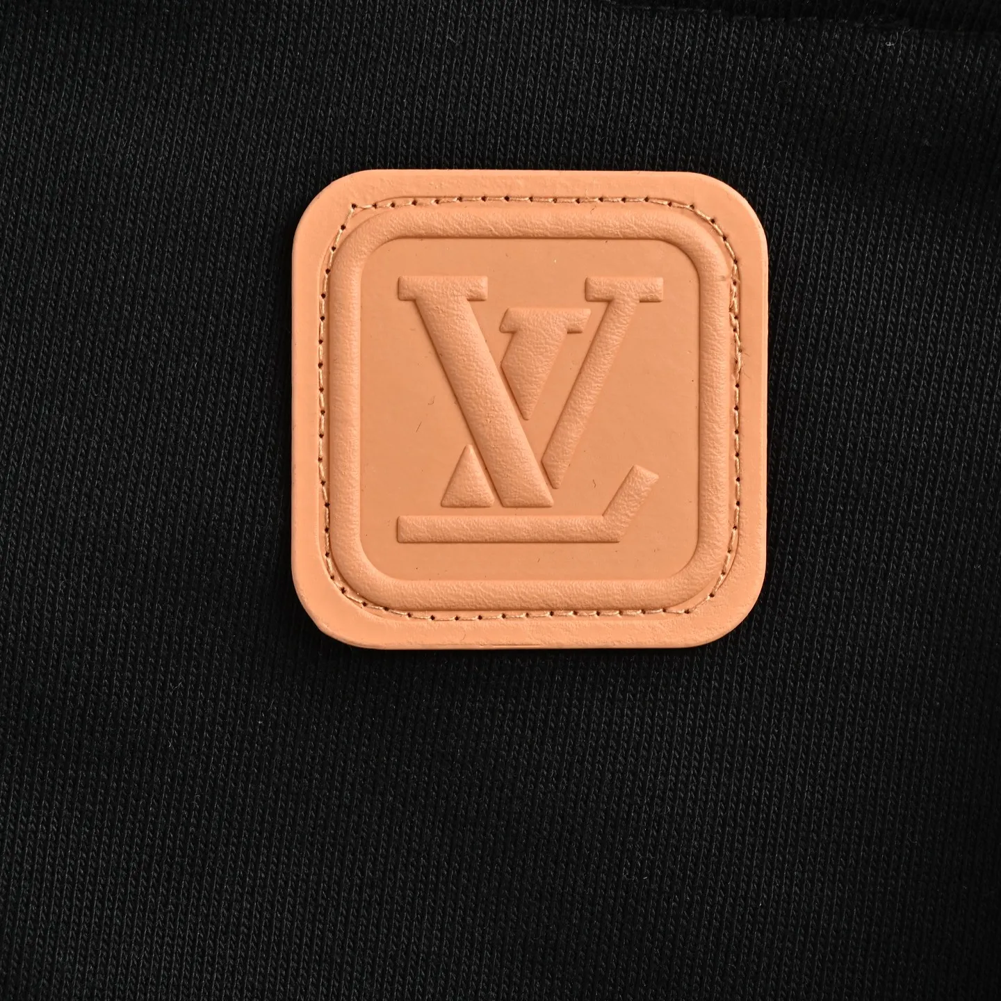 Louis Vuitton/Louis Vuitton embossed leather logo hooded sweatshirt
